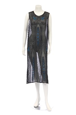 Lot 391 - A black chiffon flapper tabard embellished with blue and black cut-beads, circa 1924