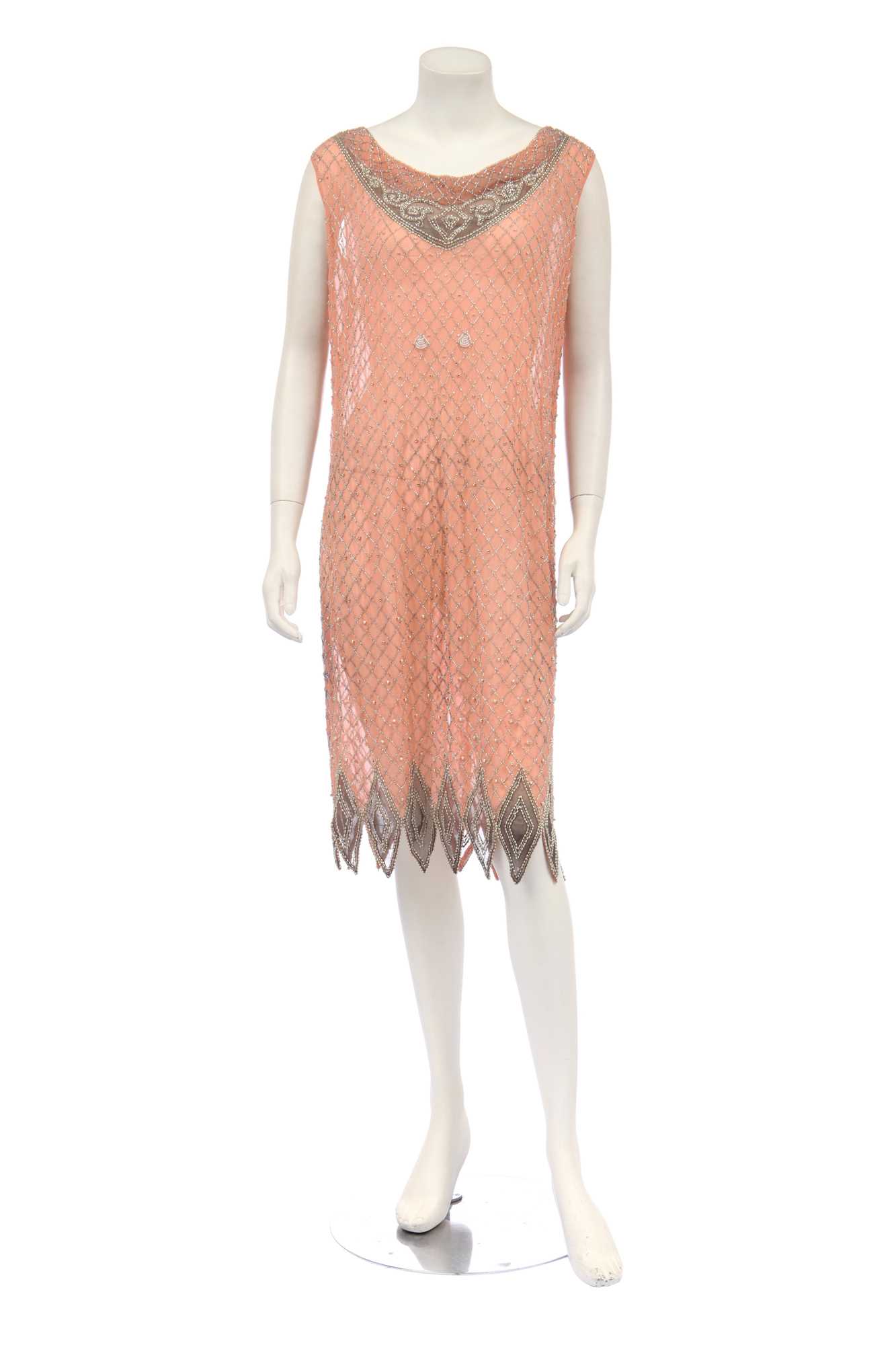 Lot 381 - A beaded peach chiffon flapper dress, circa 1925