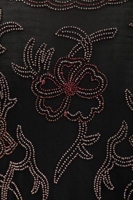 Lot 381 - A beaded peach chiffon flapper dress, circa 1925