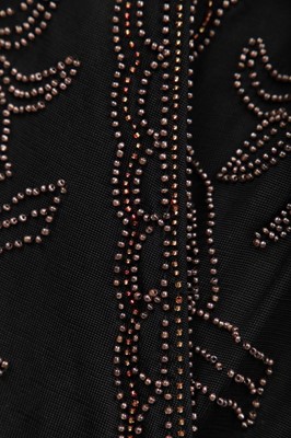 Lot 381 - A beaded peach chiffon flapper dress, circa 1925