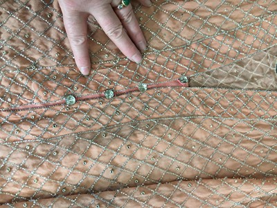 Lot 381 - A beaded peach chiffon flapper dress, circa 1925
