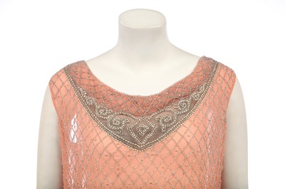 Lot 381 - A beaded peach chiffon flapper dress, circa 1925