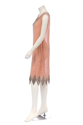 Lot 381 - A beaded peach chiffon flapper dress, circa 1925