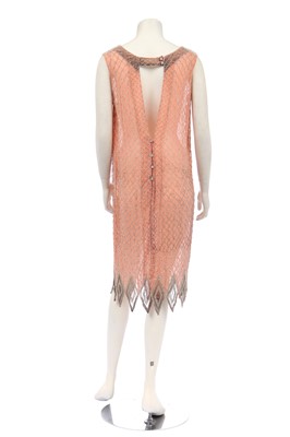 Lot 381 - A beaded peach chiffon flapper dress, circa 1925