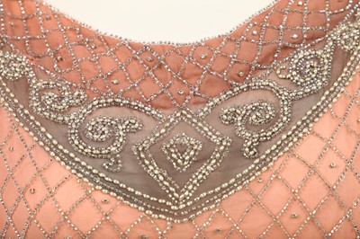 Lot 381 - A beaded peach chiffon flapper dress, circa 1925