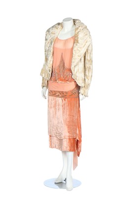 Lot 344 - A Bradley's of London peach velvet and chiffon flapper dress, late 1920s