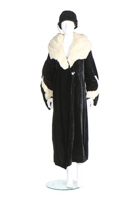 Lot 328 - Two black velvet coats, 1930s