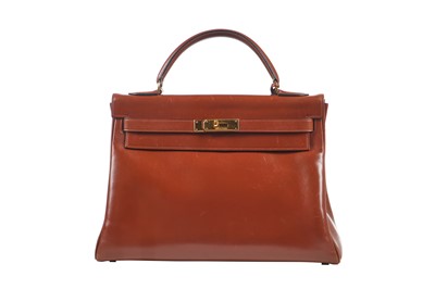 Lot 68 - An Hermès tobacco-brown box leather Kelly 32, 1978