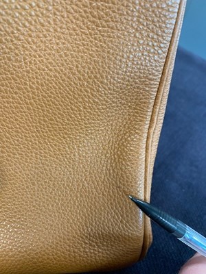 Lot 70 - An Hermès golden-brown clemence leather Birkin 35, 2001