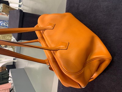 Lot 72 - An Hermès orange clemence leather Victoria II 35, 2007