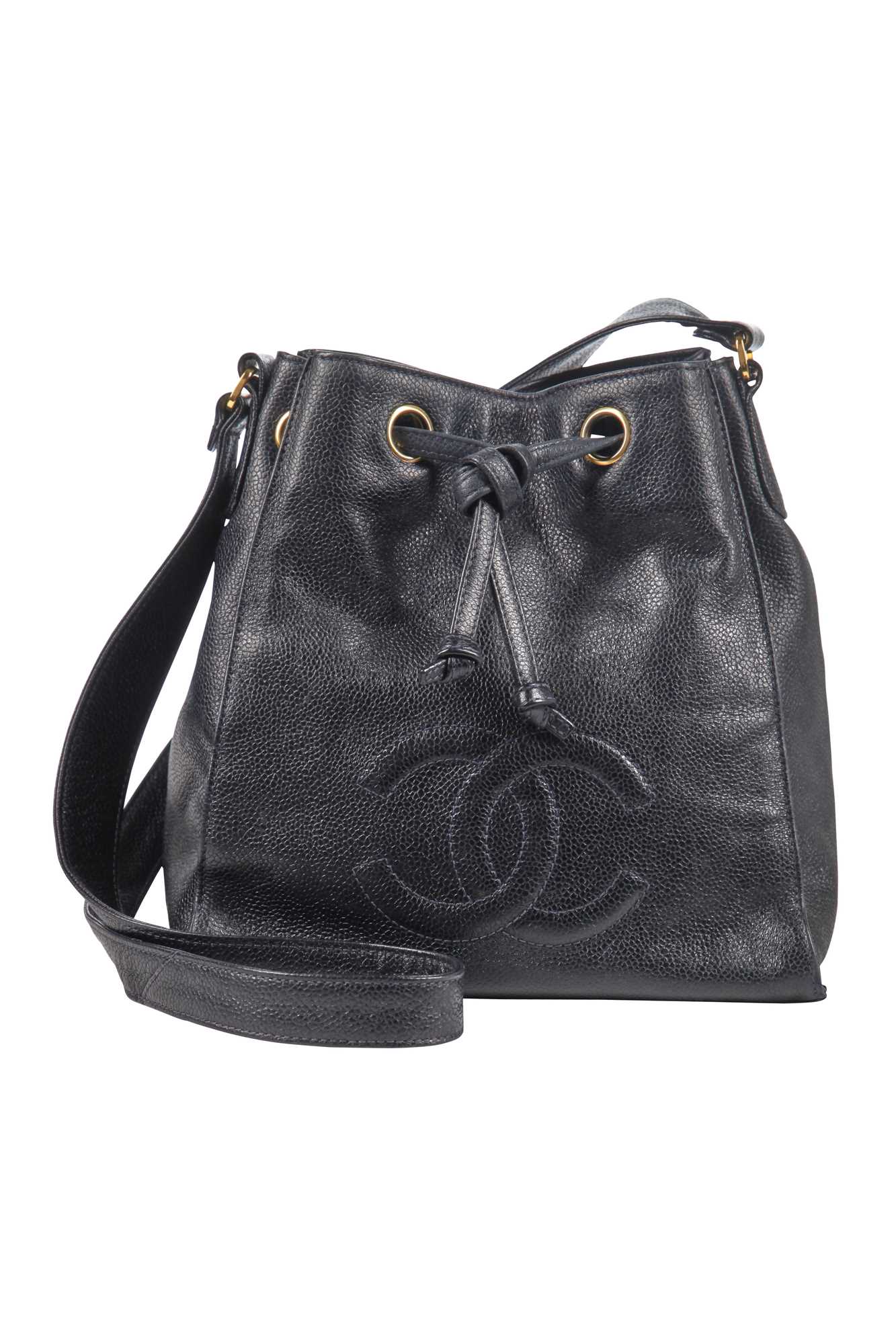 Lot 15 - A Chanel navy leather bucket bag with leather