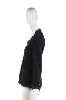 Lot 27 - A Chanel black bouclé wool single-breasted jacket, 1990s