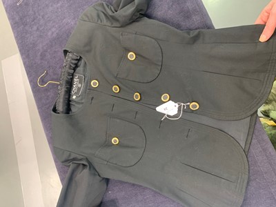 Lot 24 - A Chanel ivory bouclé wool jacket, 1990s