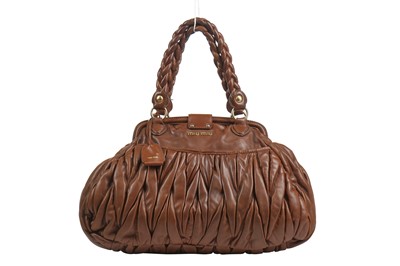Lot 28 - A Miu Miu ruched brown leather handbag, 2000s-