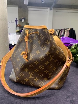 Lot 12 - A Louis Vuitton monogrammed canvas and leather bucket bag, probably 1980s