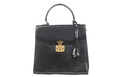 Lot 14 - A Gucci black leather handbag, 1980s