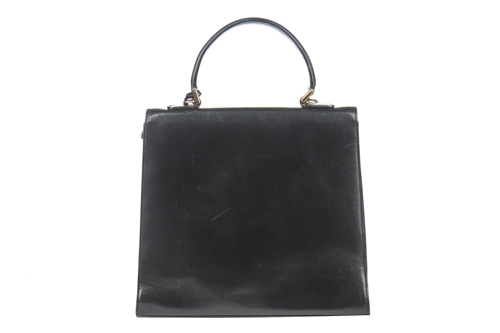 Lot 14 - A Gucci black leather handbag, 1980s,