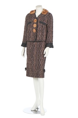Lot 133 - A Louis Vuitton tweed suit in shades of pink and brown, modern