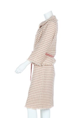 Lot 133 - A Louis Vuitton tweed suit in shades of pink and brown, modern
