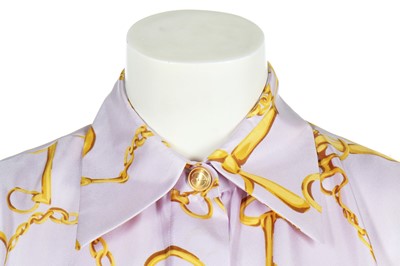 Lot 170 - A Gucci lilac silk shirt printed with horse-bit repeats, 1990s
