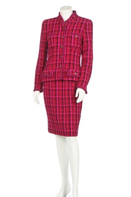 Lot 20 - A Chanel fuchsia-pink and black tweed suit, Autumn-Winter 1995-96