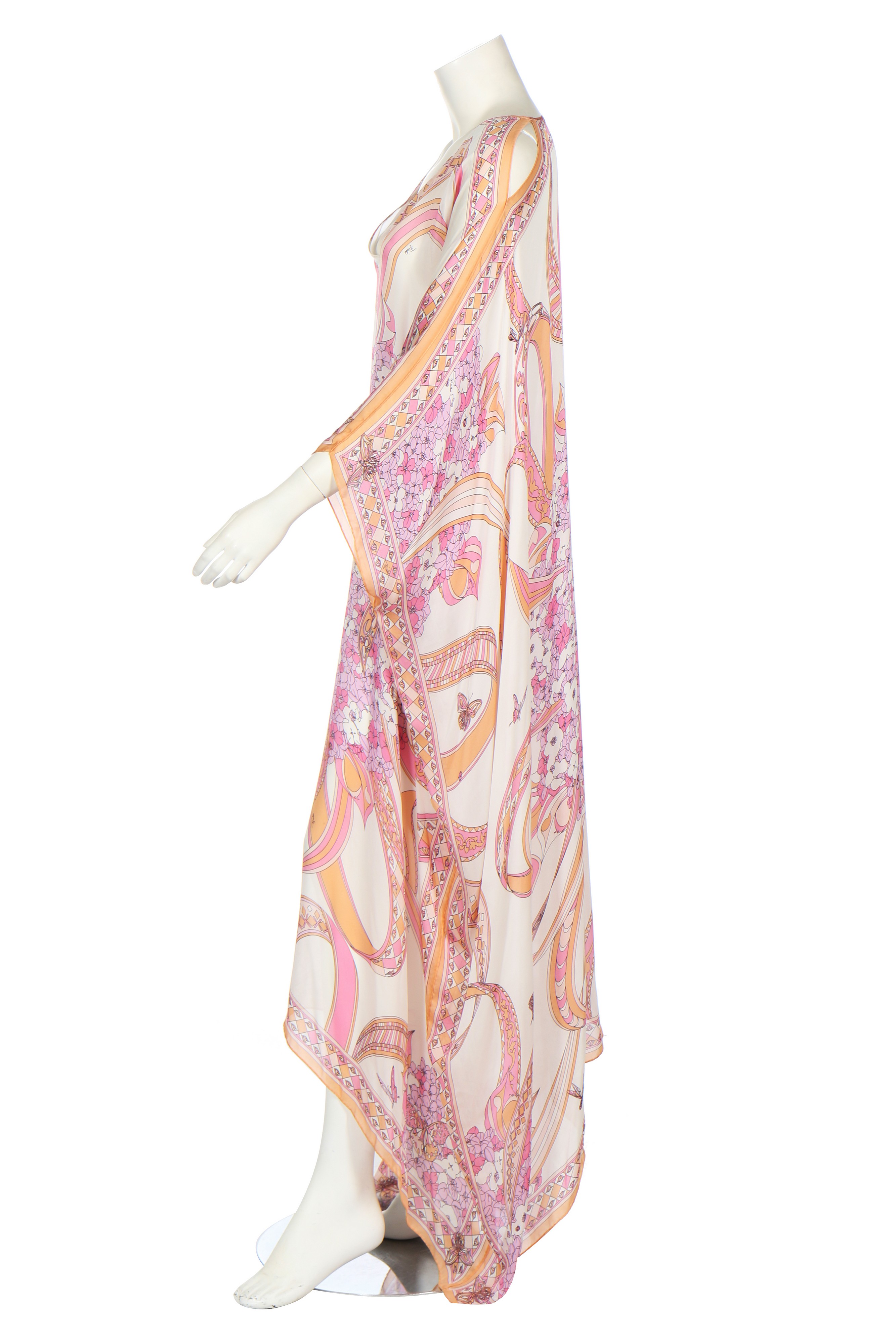 Lot 98 - Two Pucci printed silk cover-ups in shades of