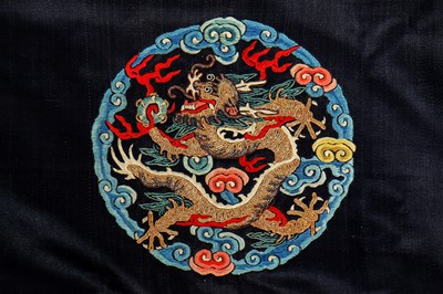 Lot 465 - A satin panel embroidered with dragons, Chinese, circa 1900