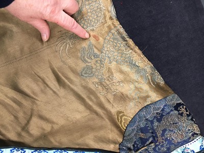Lot 473 - A brocaded satin dragon robe, jifu, Chinese, Qing dynasty, second half of the 18th century