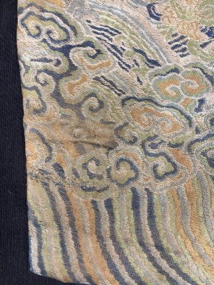 Lot 473 - A brocaded satin dragon robe, jifu, Chinese, Qing dynasty, second half of the 18th century