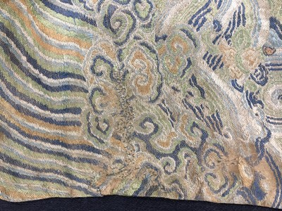 Lot 473 - A brocaded satin dragon robe, jifu, Chinese, Qing dynasty, second half of the 18th century