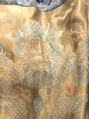 Lot 473 - A brocaded satin dragon robe, jifu, Chinese, Qing dynasty, second half of the 18th century