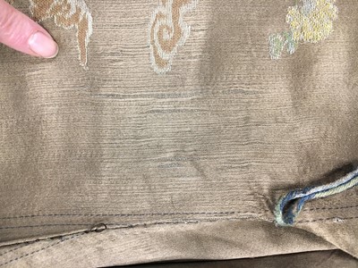 Lot 473 - A brocaded satin dragon robe, jifu, Chinese, Qing dynasty, second half of the 18th century