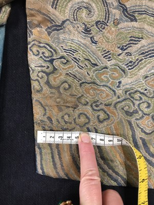 Lot 473 - A brocaded satin dragon robe, jifu, Chinese, Qing dynasty, second half of the 18th century