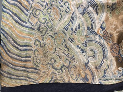 Lot 473 - A brocaded satin dragon robe, jifu, Chinese, Qing dynasty, second half of the 18th century