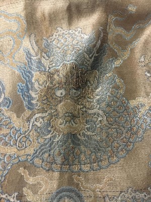 Lot 473 - A brocaded satin dragon robe, jifu, Chinese, Qing dynasty, second half of the 18th century