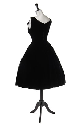 Lot 237 - A black velvet cocktail dress, probably Pierre Balmain, circa 1955