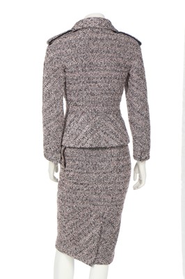 Lot 65 - A Chanel pink, black and silver bouclé wool suit, circa 2016