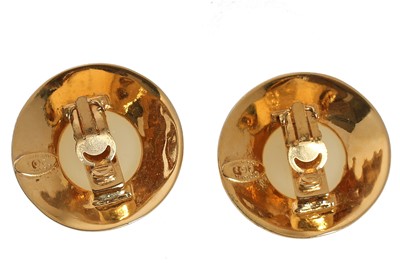 Lot 49 - Two pairs of Chanel gilt metal clip-on earrings, 1990s
