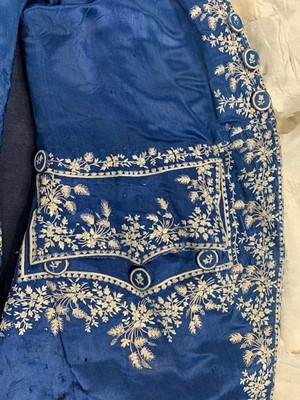 Lot 422 - A gentleman's embroidered blue silk frock coat, 1780s