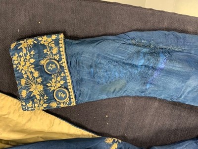 Lot 422 - A gentleman's embroidered blue silk frock coat, 1780s