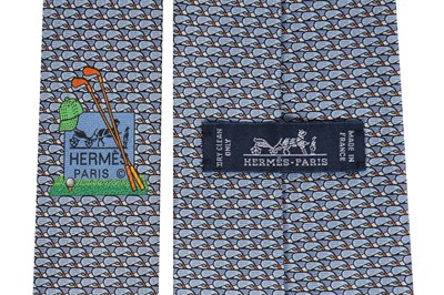 Lot 205 - Four Hermès printed silk ties, mainly in shades of blue, modern
