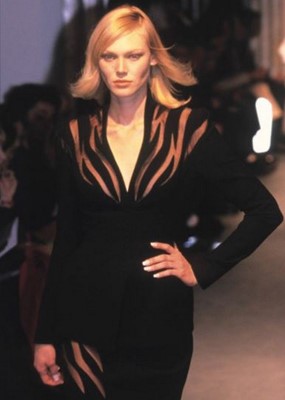 Lot 184 - A Thierry Mugler black gabardine suit with sheer insertions, Spring-Summer 1998