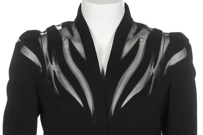 Lot 184 - A Thierry Mugler black gabardine suit with sheer insertions, Spring-Summer 1998