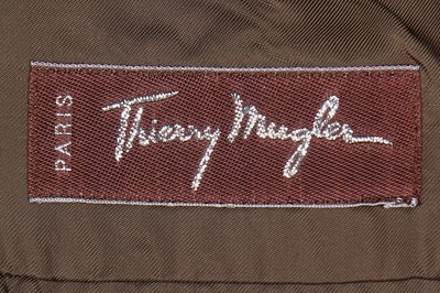 Lot 187 - A good Thierry Mugler green wool suit, circa 1991