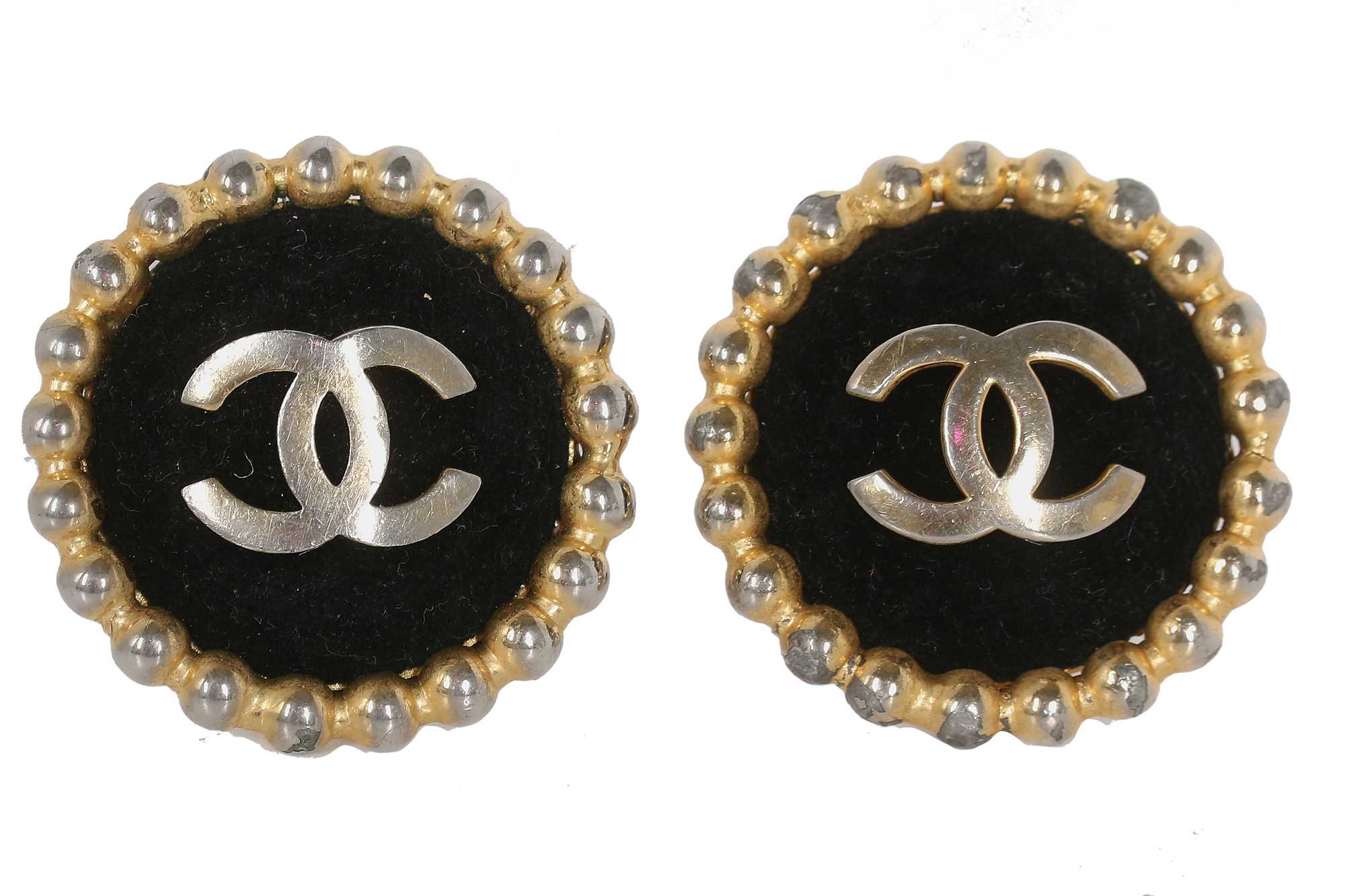Lot 47 - Two pairs of Chanel gilt-metal clip-on circular earrings, 1980s-1990s
