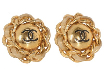 Lot 47 - Two pairs of Chanel gilt-metal clip-on circular earrings, 1980s-1990s