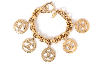 Lot 45 - A Chanel gilt metal charm bracelet, circa 1989
