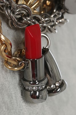 Lot 43 - A Dolce & Gabbana 'lipstick' charm necklace, 2000s
