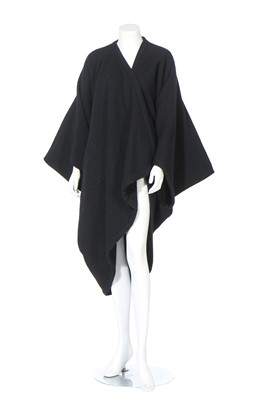 Lot 217 - An Issey Miyake black knitted cocoon-shaped coat, circa 1985