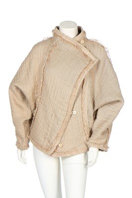 Lot 220 - An Issey Miyake puckered cotton jacket with frayed edging, early 1980s